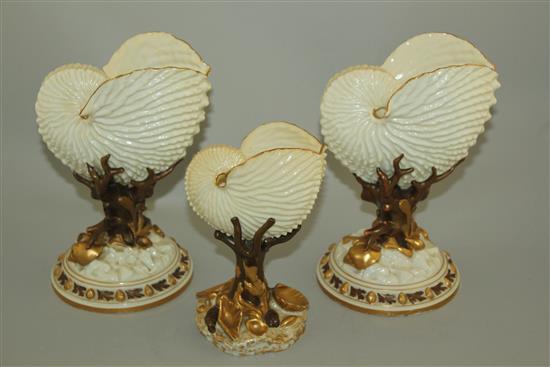 Three Royal Worcester nautilus shell vases, late 19th century, 22cm and 17.5cm